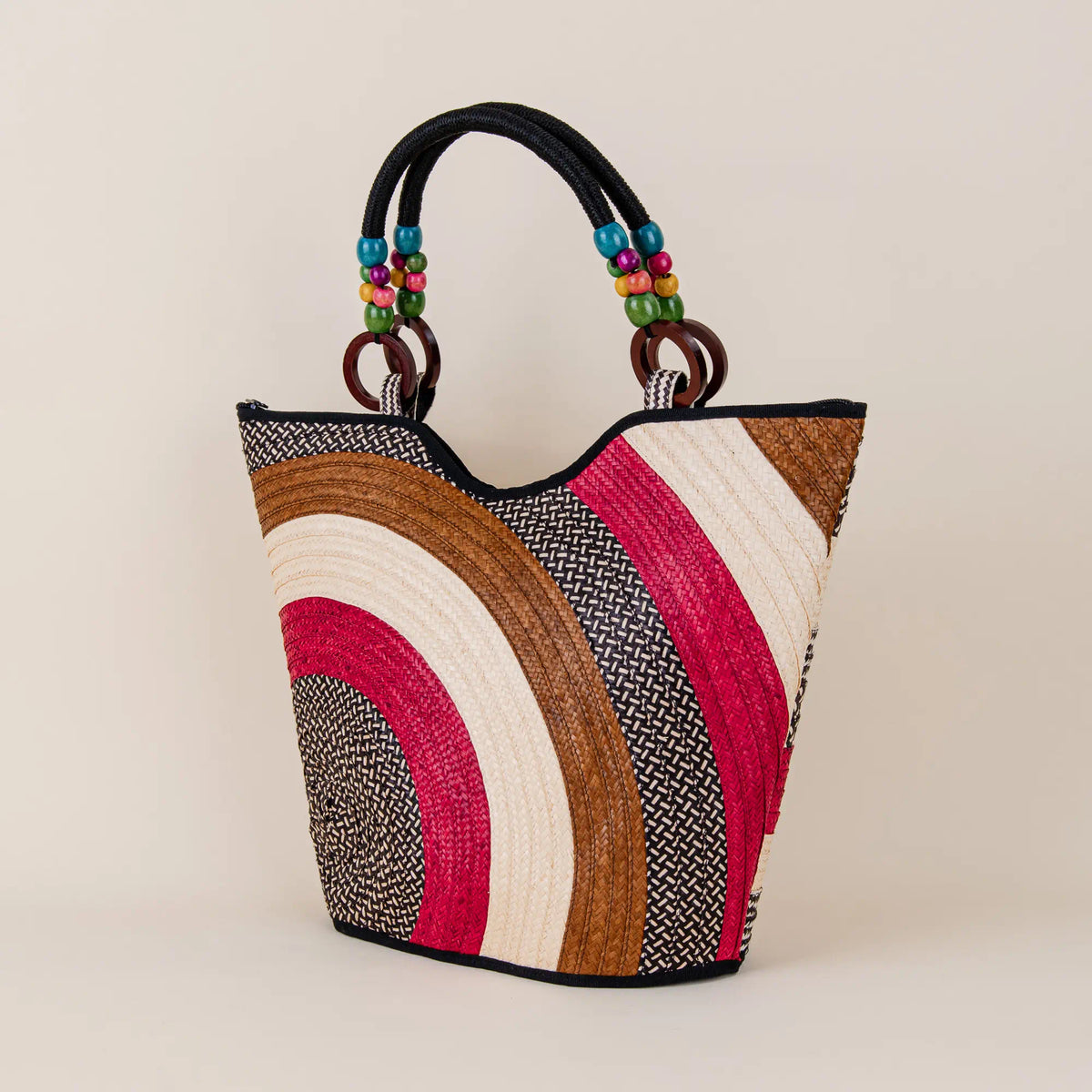 Guatape handcrafted Arrow Cane Handbag with colorful geometric weaving and artisan details – Maison Monserrate