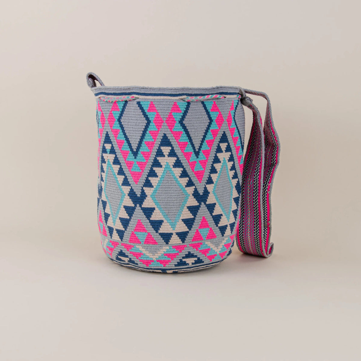 Back view of Manati Wayuu Mochila featuring detailed geometric Wayuu weaving and colorful shoulder strap – Maison Monserrate