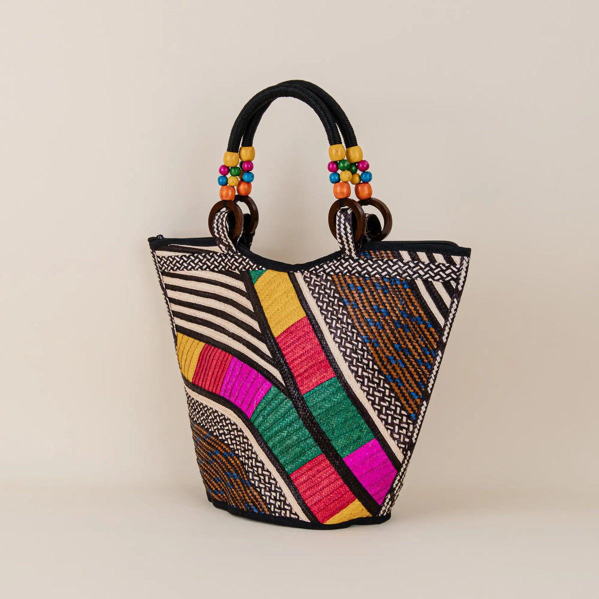 Samaniego handcrafted Arrow Cane Handbag showing geometric weaving and Colombian artisan details – Maison Monserrate