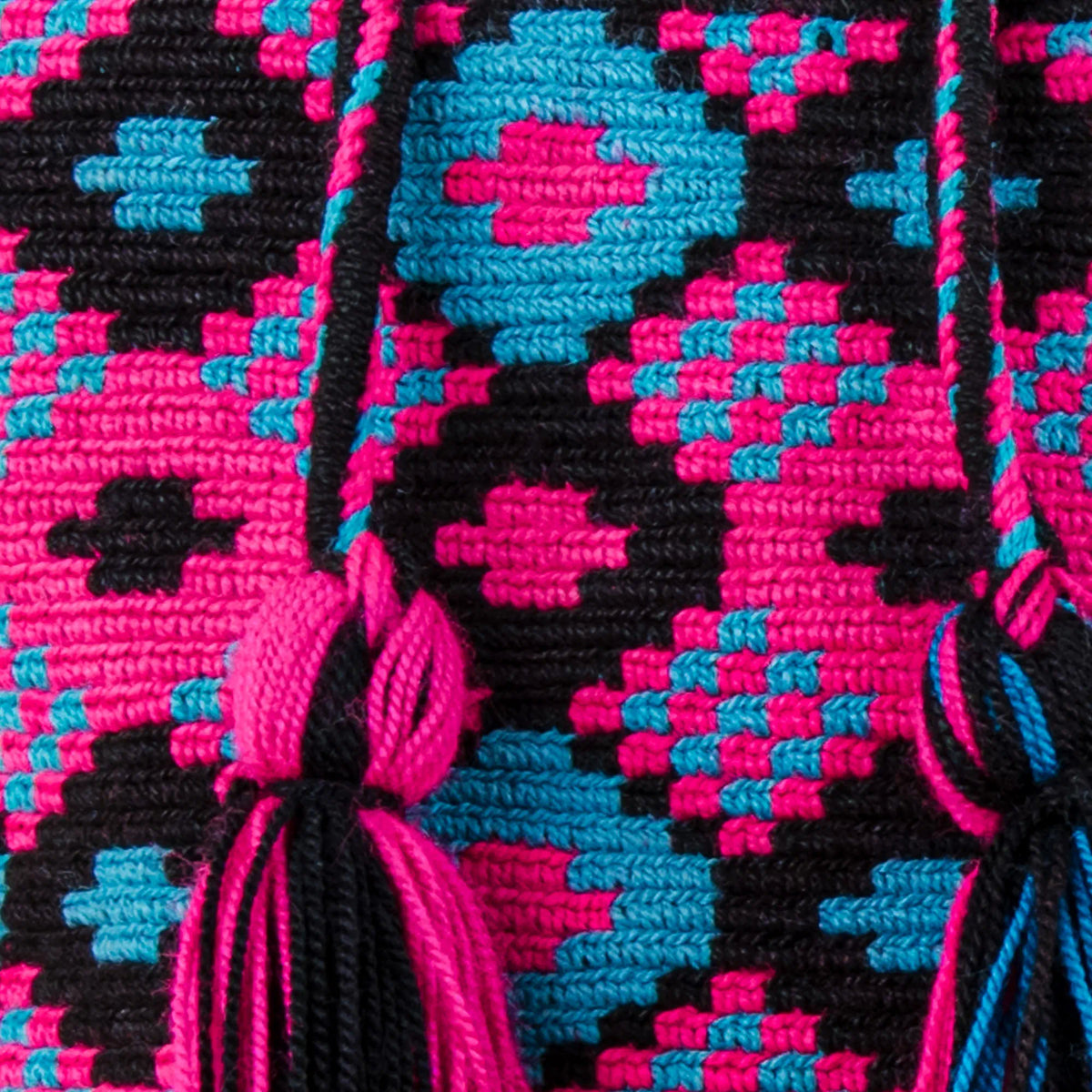 Close-up of San Agustin Wayuu Mochila showing detailed Wayuu weaving and handcrafted tassels – Maison Monserrate