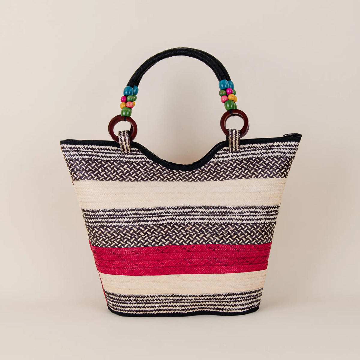 Back view of Guatape Arrow Cane Handbag showing traditional Colombian artisan weaving – Maison Monserrate