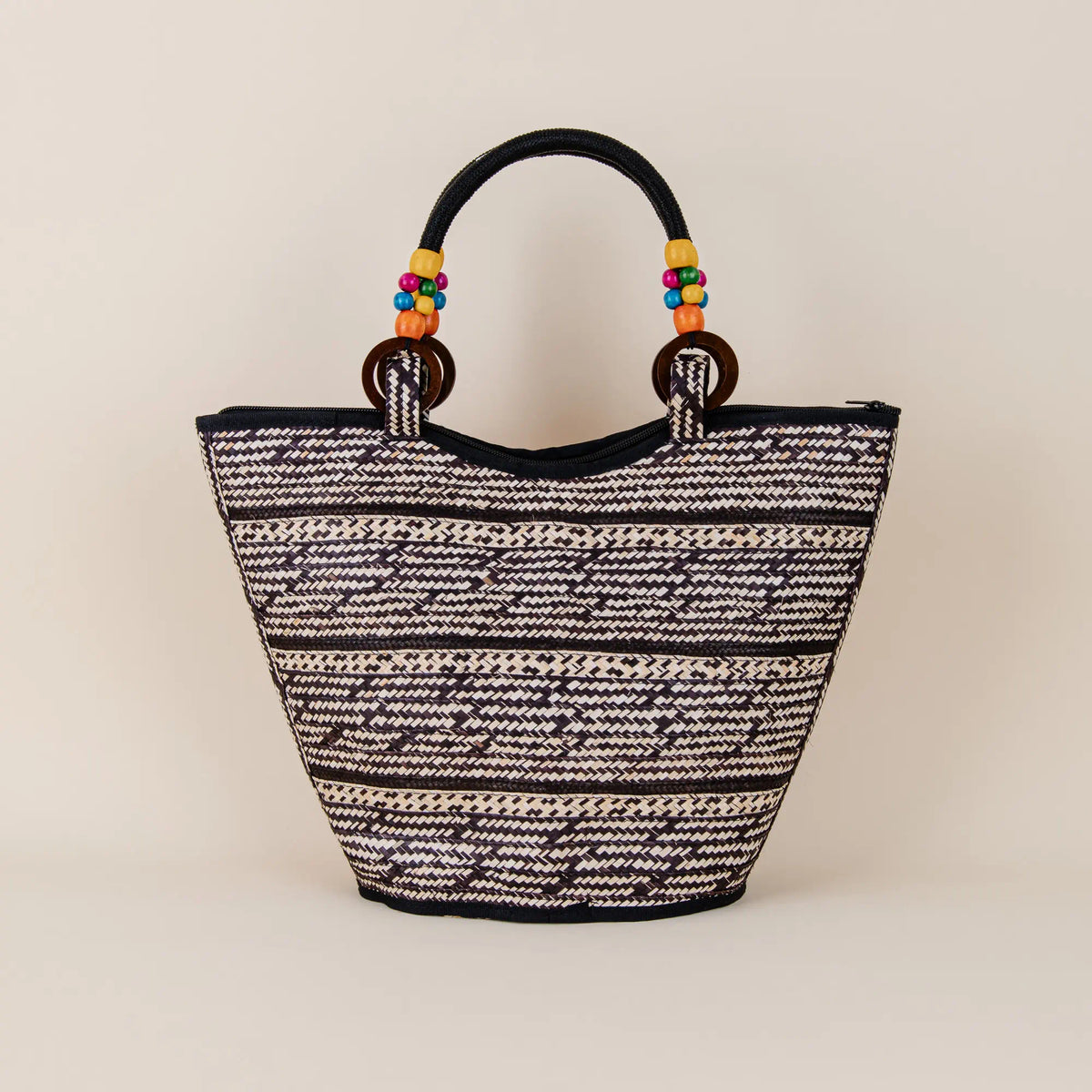 Back view of Samaniego Arrow Cane Handbag showing traditional Colombian handwoven arrow cane craftsmanship – Maison Monserrate